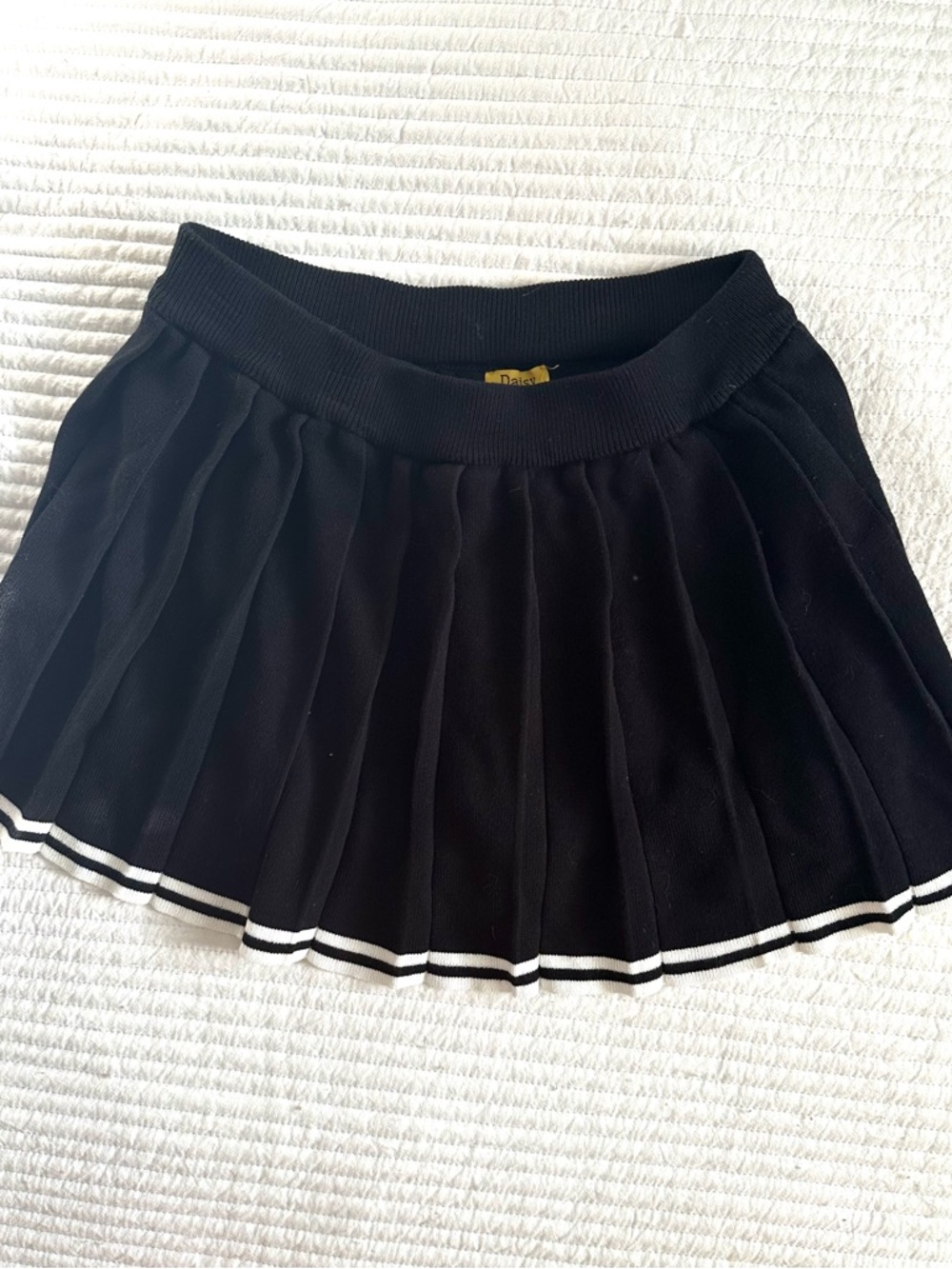Daisy Black Pleated Altheltic Skirt with White Stripe Hem and Built in Shorts